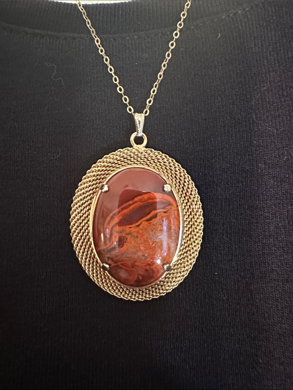 Vintage gold-toned pendant‎ necklace -large, oval, reddish-orange cabochon stone